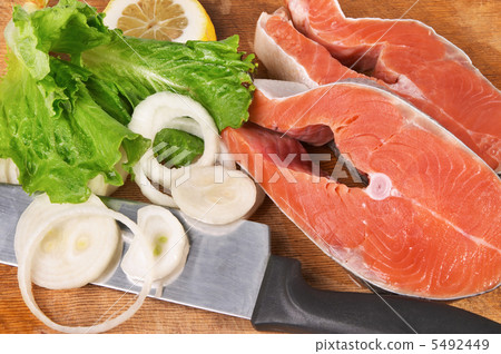 Salmon pieces on cooking desk 5492449