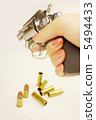 Woman's hand holding a gun 5494433