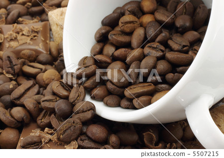 White cup and coffee beans 5507215