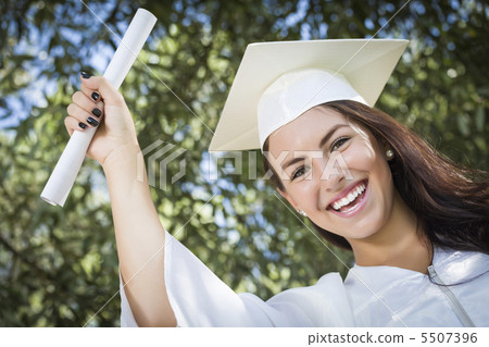 Graduating Mixed Race Girl In Cap and Gown with Diploma Graduating Mixed Race Girl In Cap and Gown with Diploma 5507396