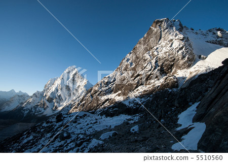 Cho La pass peaks at dawn in Himalaya mountains 5510560