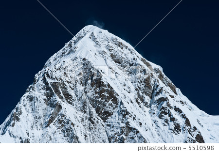 Pumori peak and blue sky in Himalayas, Nepal Pumori peak and blue sky in Himalayas, Nepal 5510598