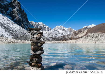 Harmony: Stone stack and Sacred Gokyo Lake 5510616