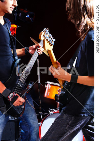 Men playing  guitar. 5511550