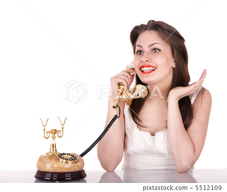 Young beautiful woman talking by phone. 5512109