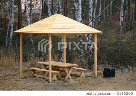 wooden summerhouse in the park wooden summerhouse in the park 5515206