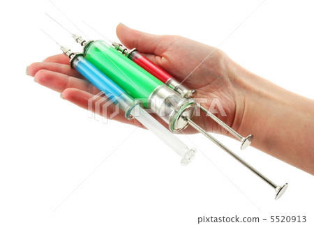 Three reusable syringes with acid substance in hands Three reusable syringes with acid substance in hands 5520913