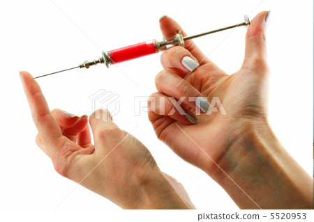 Reusable syringe full of acid substance in hands Reusable syringe full of acid substance in hands 5520953