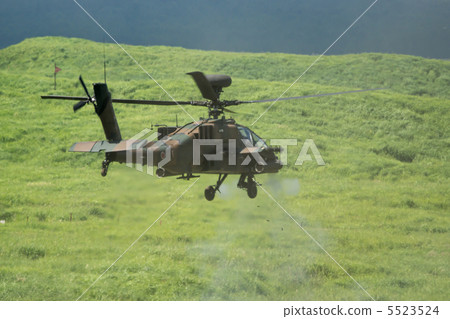 AH-64D Apache during shooting AH-64D Apache during shooting 5523524
