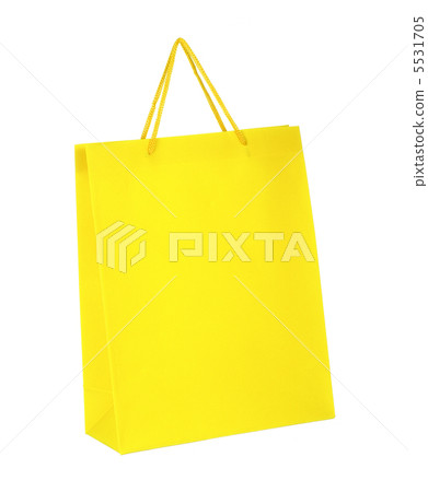 Yellow shopping paper bag isolated on white background Yellow shopping paper bag isolated on white background 5531705