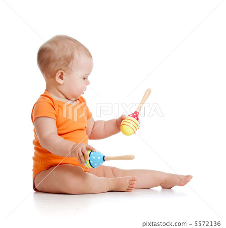 baby playing with musical toy baby playing with musical toy 5572136