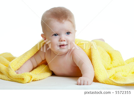 Adorable happy baby in yellow towel Adorable happy baby in yellow towel 5572355