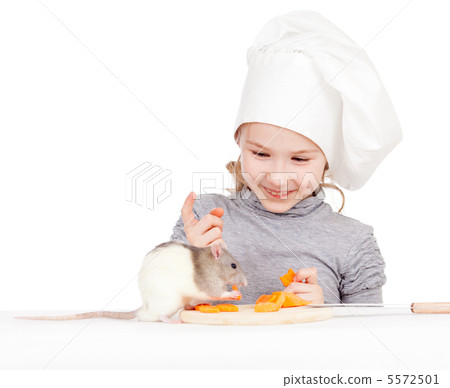 Chef girl preparing healthy food. Helper domestic rat sitting an 5572501