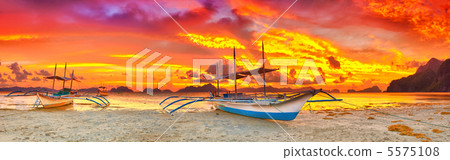 Boat at sunset 5575108