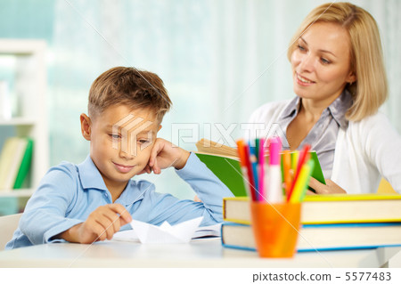 Boy with paper plane 5577483