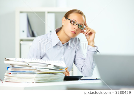 Thoughtful employee 5580459