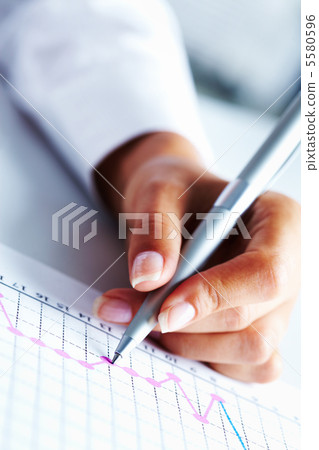 Hand with pen Hand with pen 5580596