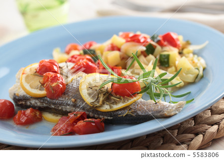 Baked sea bass with vegetables Baked sea bass with vegetables 5583806