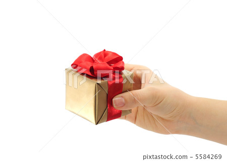 Hand holds present box Hand holds present box 5584269