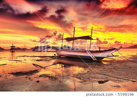 Boat at sunset 5599196