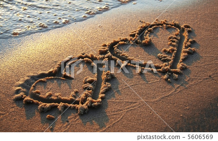 Two hearts on sand 5606569