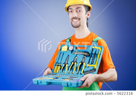 Repairman with his toolkit Repairman with his toolkit 5622316
