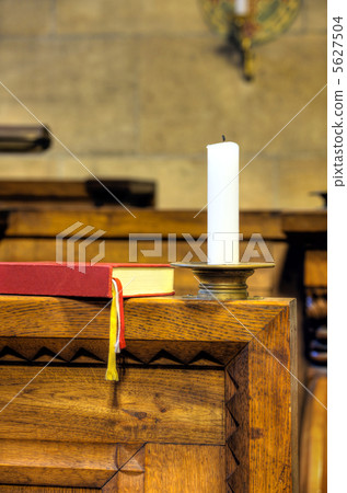 Detail of hymnal and candle 5627504