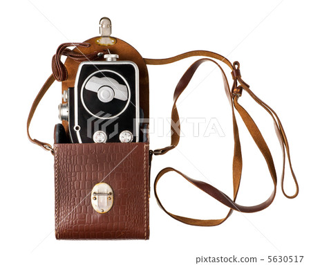Retro film camera isolated on white 5630517