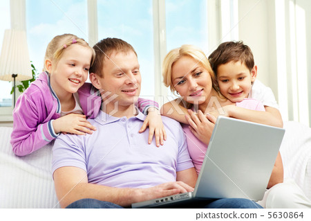 Family and laptop Family and laptop 5630864