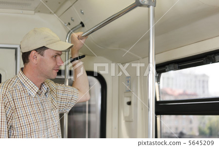 Man in the metro train Man in the metro train 5645209