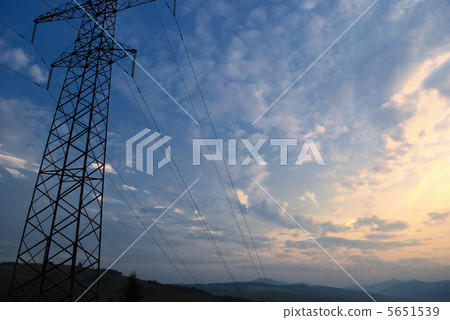 Sunset in mountains and electrified track Sunset in mountains and electrified track 5651539