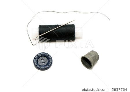Thread with a needle and a thimble Thread with a needle and a thimble 5657764
