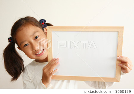 A girl with a white board 5660129