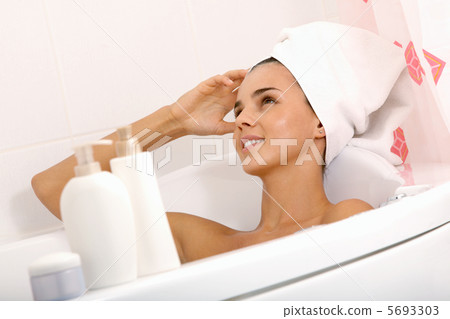 Relaxing in bath Relaxing in bath 5693303