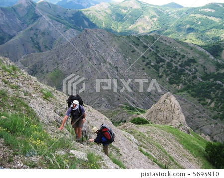 Climbers on the mountains 5695910
