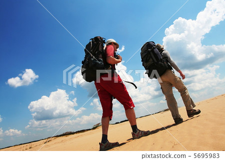 Hike in desert 5695983