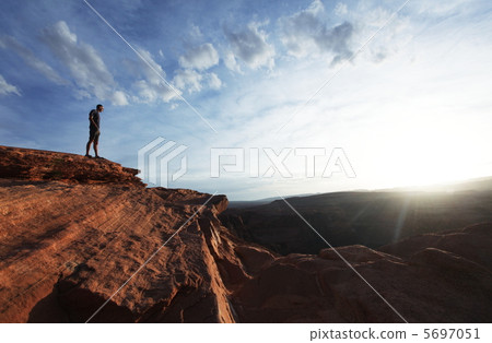 Man on the cliff Man on the cliff 5697051