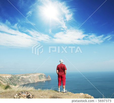 Man on the cliff Man on the cliff 5697373