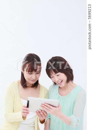Ipad and female 5699213