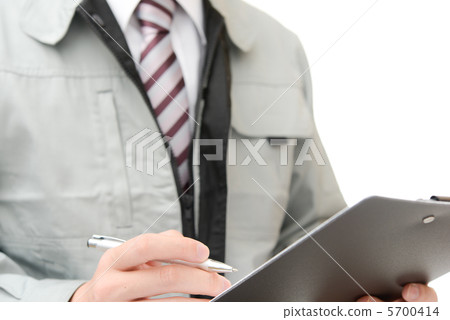 A man with a clipboard 5700414