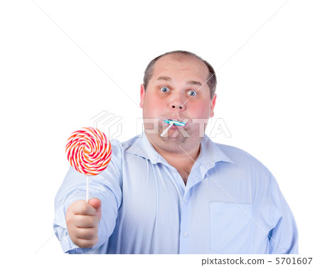 Fat Man in a Blue Shirt, Eating a Lollipop Fat Man in a Blue Shirt, Eating a Lollipop 5701607