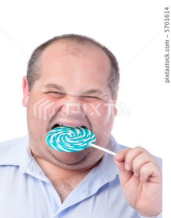 Fat Man in a Blue Shirt, Eating a Lollipop Fat Man in a Blue Shirt, Eating a Lollipop 5701614