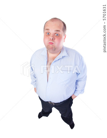 Fat Man in a Blue Shirt, Contorts Antics, wide-angle top view Fat Man in a Blue Shirt, Contorts Antics, wide-angle top view 5701631