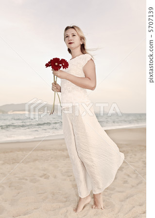 Young woman with flowers Young woman with flowers 5707139