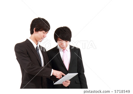 Two businessmen watching the iPad 5718549