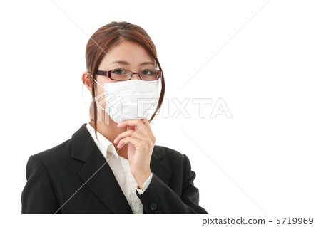 A woman with a mask and glasses 5719969