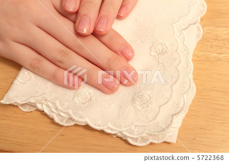 Add a hand to a white handkerchief 5722368