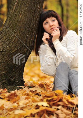 The girl in an autumn forest The girl in an autumn forest 5739600