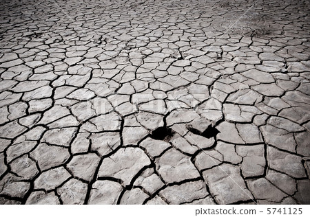 Cracked soil of desert Cracked soil of desert 5741125