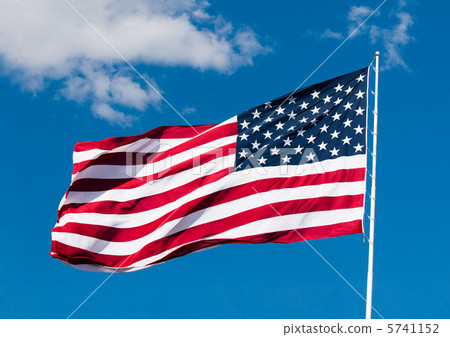 american flag over blue sky background american flag over blue sky background 5741152